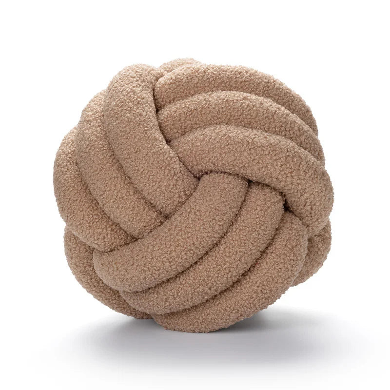 Coussin boule nouée – Douceur décorative et unique